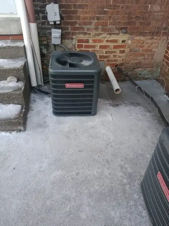 Outdoor HVAC condenser beside a home